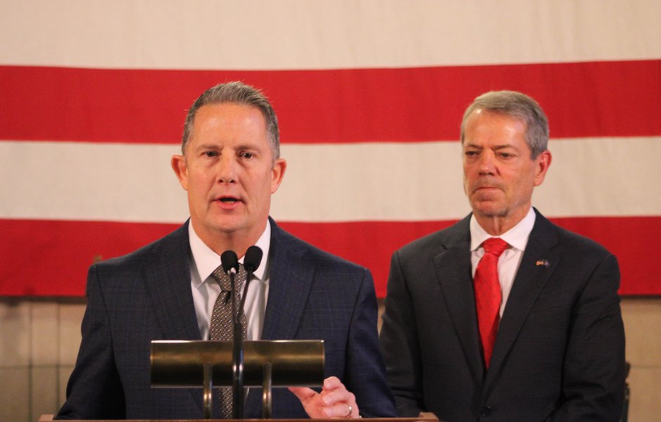 Judge Jeffrey Funke speaks Friday as Governor Jim Pillen looks on